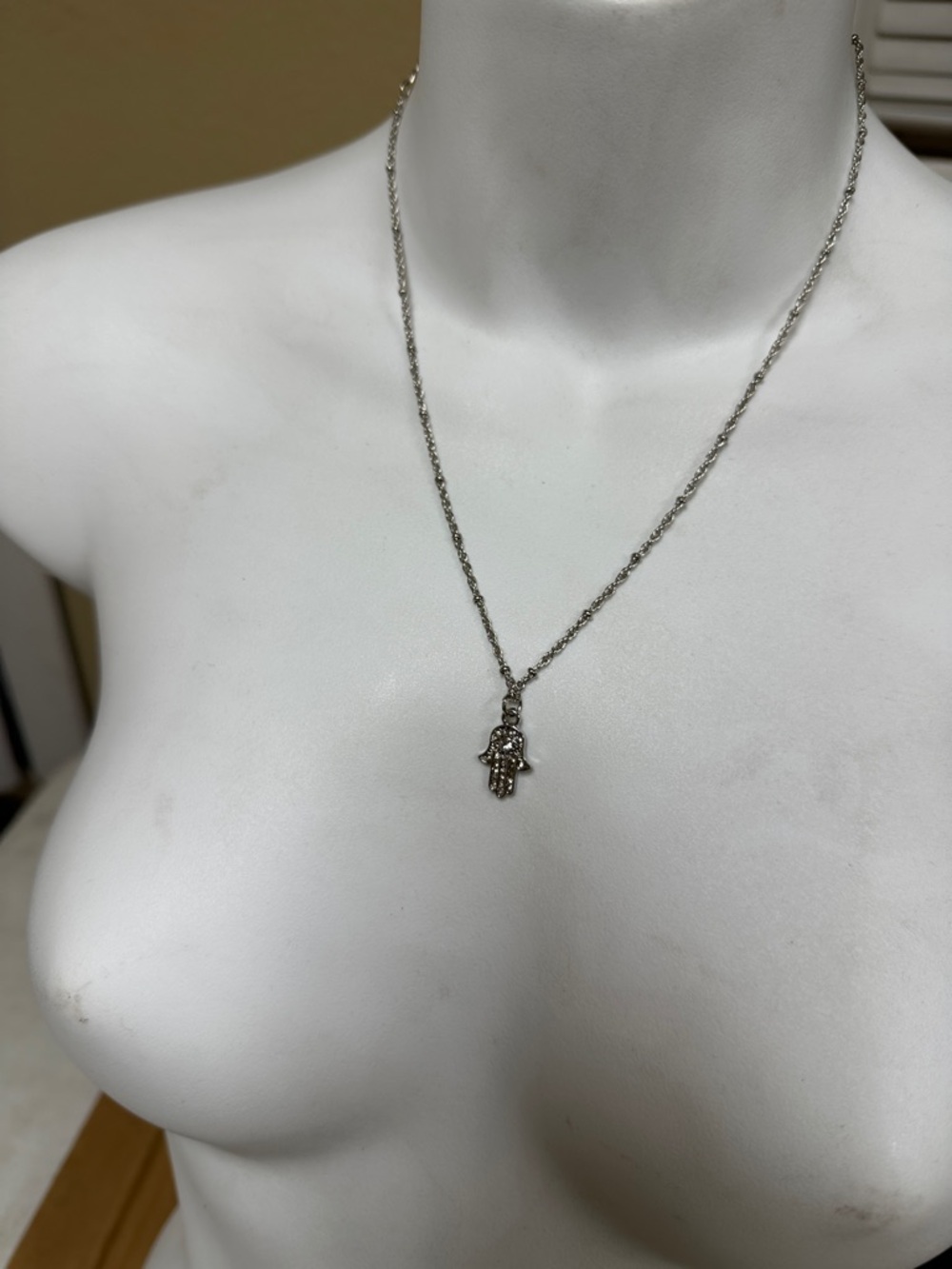 ##111, Guess by Marciano Silver Hamsa Hand Pendant Necklace